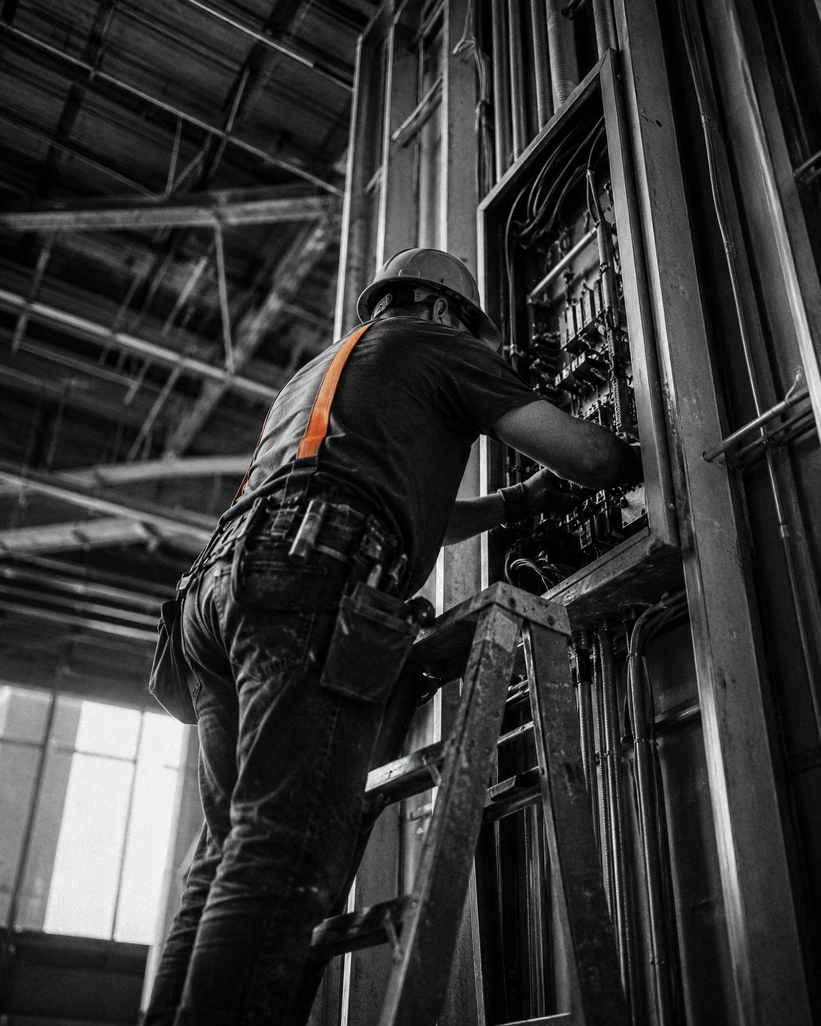 Electrical tradesperson at work